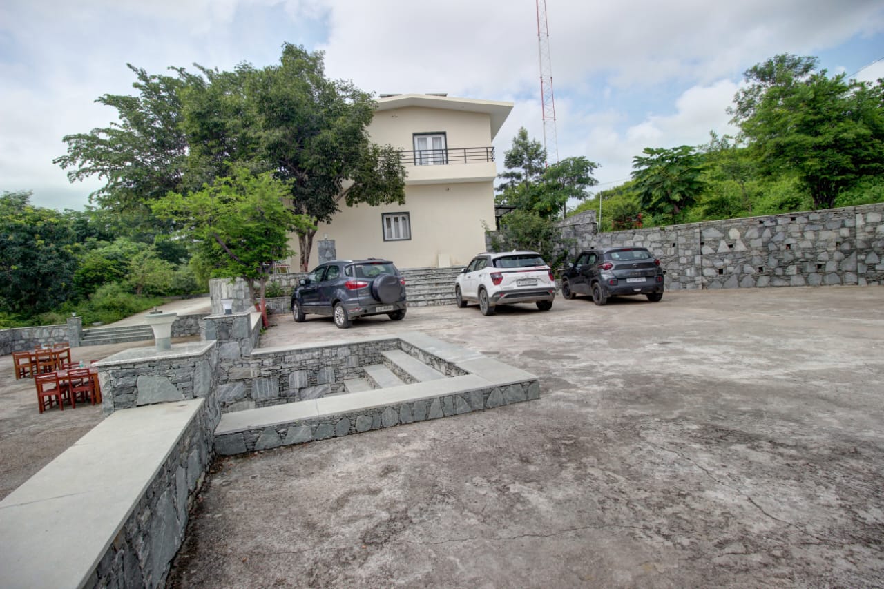 Takhat Villa architecture with garden path