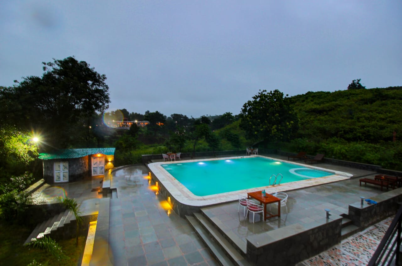 Sundowner experience at Takhat Villa pool at golden hour