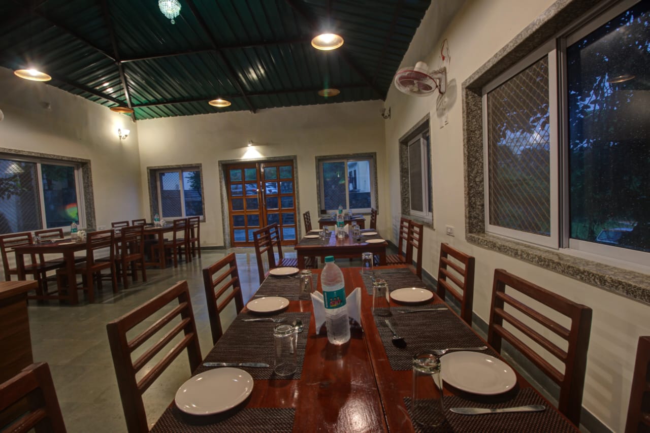 Open-air dining setup at Takhat Villa